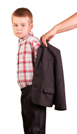 Hands women dress a jacket student to go to school isolated on white background.の写真素材
