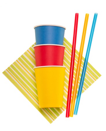 Bright disposable paper cups, straws and napkin isolated on a white background.の写真素材