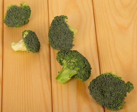 Fresh broccoli close-up on a background of light wood.の写真素材
