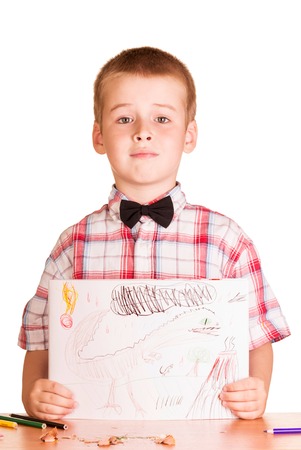 Figure in the cute boy's hand isolated on white background.の写真素材