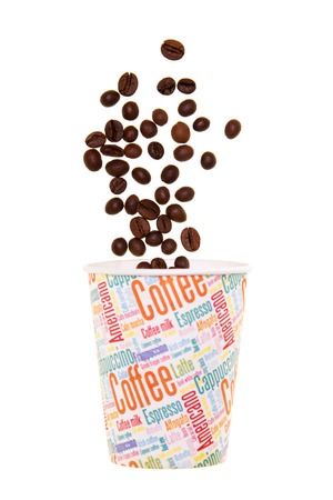 Paper cup and falling coffee beans isolated on white background.の写真素材