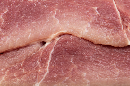 Pieces of fresh raw pork meat close-up. Texture.の写真素材