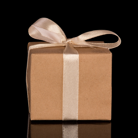 Gift box surprise isolated on black backgroundの写真素材