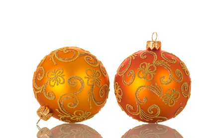 Two bright orange balls isolated on a white backgroundの写真素材