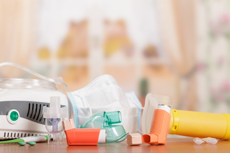 Medical equipment for inhalation, respiratory mask,disposable face mask on yellowの写真素材