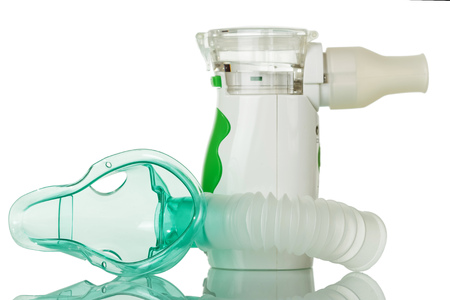 Ultrasonic mesh nebulizer, the spacer and the mask is isolated on a white background.の写真素材