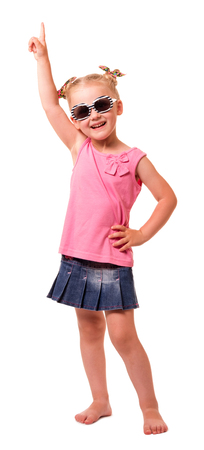 A cute little blond girl with sunglasses isolated on white background.の写真素材