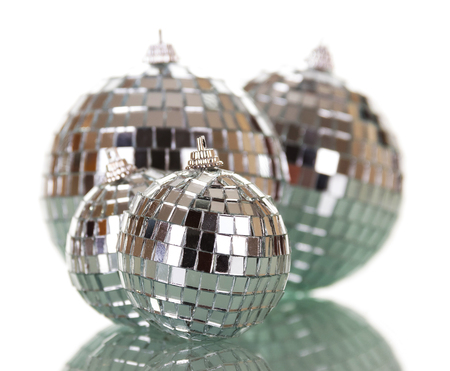 Big and small bright, mirror balls isolated on a white backgroundの写真素材