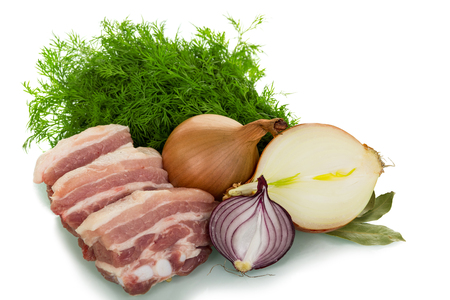 Pieces of pork brisket, different onions and bunch of dill isolated on white background.の写真素材