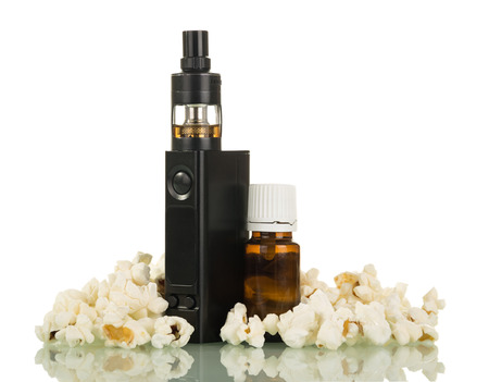 Electronic cigarette and liquid for smoking among popcorn isolated on white backgroundの写真素材