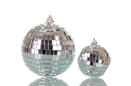Mirrored christmas balls isolated on white backgroundの写真素材