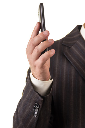 Phone in businessman's hand, isolated on white backgroundの写真素材