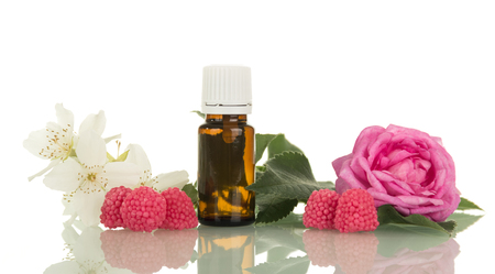 Liquid with floral scent for smoking, flowers and berries, isolated on white backgroundの写真素材