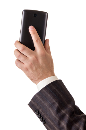 Modern mobile phone in hand of the man, isolated on white backgroundの写真素材