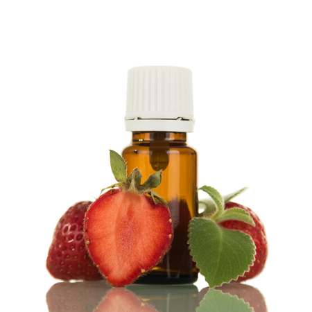 Liquid with a fruity aroma, for inhaling vapor electronic cigarettes isolated on white backgroundの写真素材
