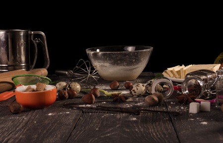 Set of products for biscuit, bowl and whisk, isolated on blackの写真素材