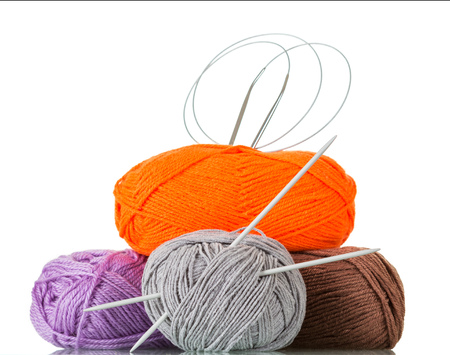 Hanks of yarn in different color and texture for handmade knitting needles isolated on whiteの写真素材
