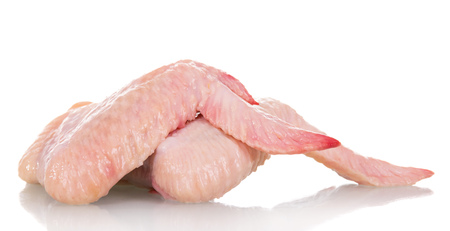 Poultry meat, fresh chicken wings isolated on whiteの写真素材