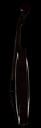 Stringed musical instrument - violin, side view, isolated on blackの写真素材