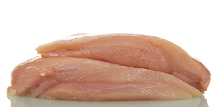 Fresh chicken meat, fillet isolated on whiteの写真素材