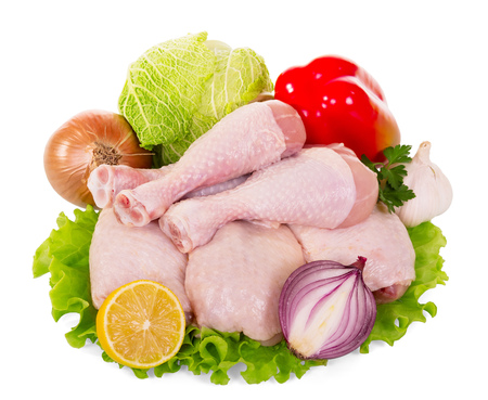 Fresh chicken leg and vegetable set for garnish, isolated on whiteの写真素材