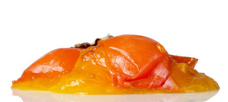 Spoiled fruit, rotten persimmon fruit, isolated on whiteの写真素材