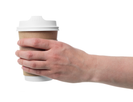 Thermal Cup for hot drinks in female hand isolated on whiteの写真素材