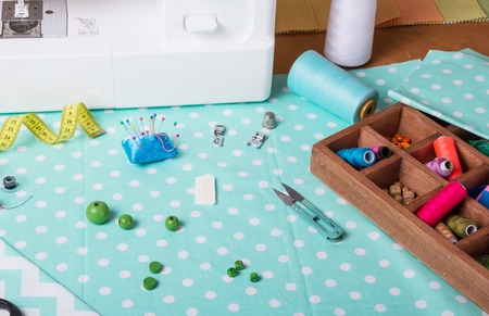 Sewing machine, sewing accessories, cloth for cutting on tableの写真素材