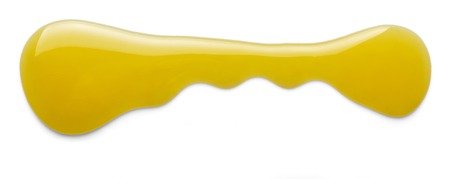 Puddle of liquid sweet honey isolated on whiteの写真素材