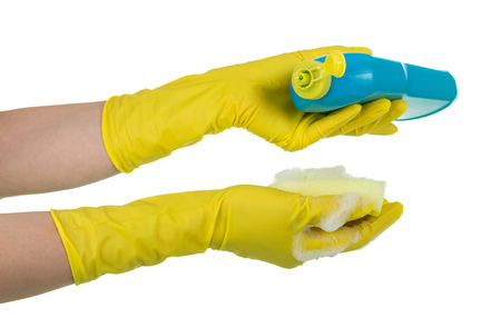 Cleaning agent and sponge in female hands isolated on white backgroundの写真素材