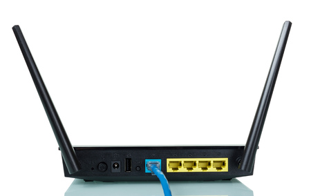 Wi-Fi router and Internet connection cable isolated on whiteの写真素材