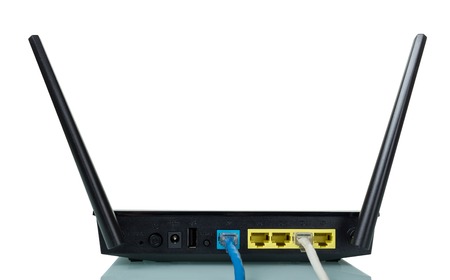 Panel of router connected with cable, isolated on whiteの写真素材