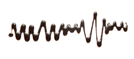 Abstract drawing of melted chocolate isolated on whiteの写真素材