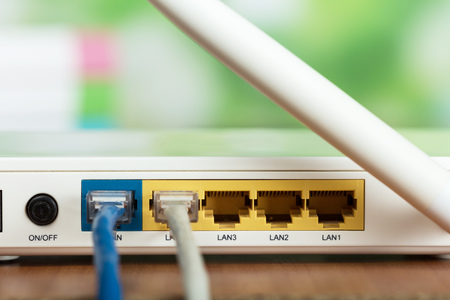 Back panel of router with sockets for connecting equipmentの写真素材