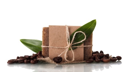 Handmade soap with coffee aroma isolated on white backgroundの写真素材