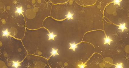 Background from bright lights of a garland in warm colors for advertisingの写真素材