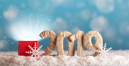 Shining magic box and the inscription 2019 new year blue backgroundの写真素材