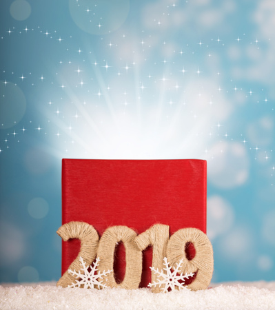 Big red box of magic on a blue background and the inscription 2019 new yearの写真素材
