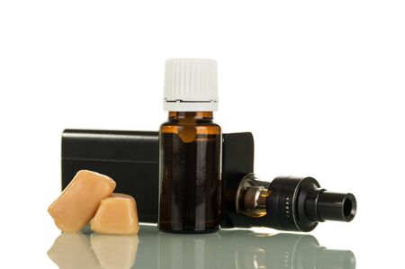 Liquid for inhaling pair of electronic cigarettes and sweets isolated on white backgroundの写真素材