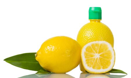 Big yellow lemon and half, juice in bottle, isolated on white backgroundの写真素材