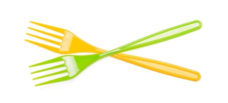 Two disposable plastic forks isolated on white backgroundの写真素材
