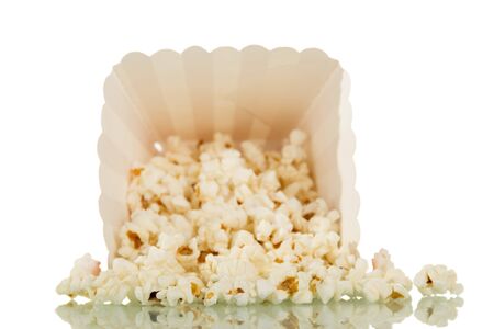 A box fell with popcorn and crumbled, isolated on white backgroundの写真素材