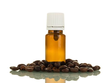 Bottle with liquid for smoking, next to scattered coffee beans, isolated on white backgroundの写真素材