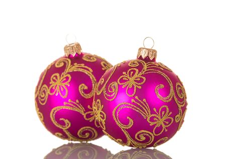 Two bright pink balls close-up, isolated on white backgroundの写真素材