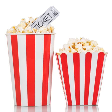 Two striped box with popcorn and movie tickets isolated on white backgroundの写真素材