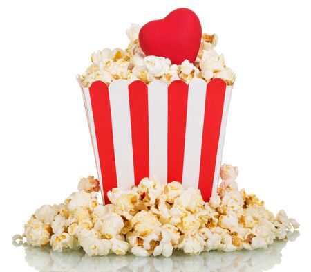 Full square box of popcorn with a red heart isolated on white backgroundの写真素材