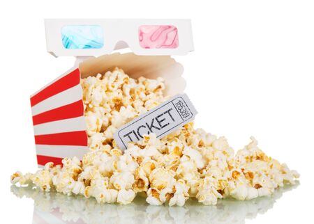 Loose popcorn in striped square box, a ticket to the cinema and 3D glasses isolated on a white backgroundの写真素材