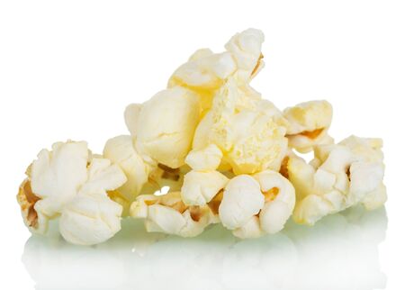 Pieces of salted popcorn isolated on white backgroundの写真素材