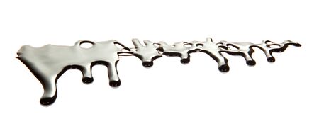 Streams of molten chocolate isolated on white backgroundの写真素材