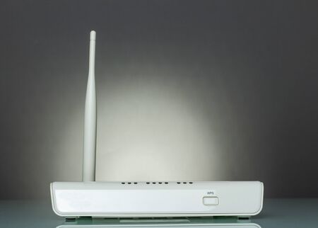 A router with WPS function on gray backgroundの写真素材